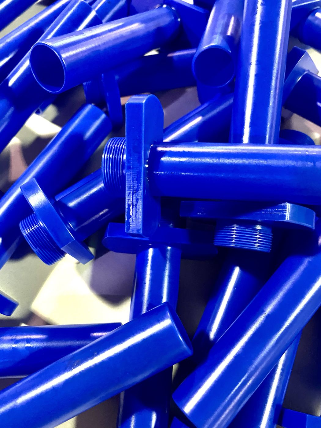 Machined blue plastic parts