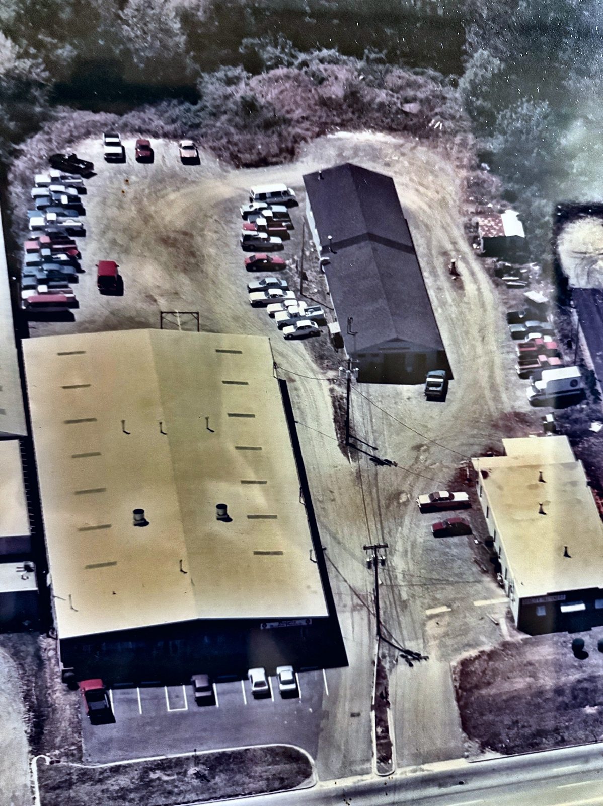 Older aerial photo of the Precision Machine Products property
