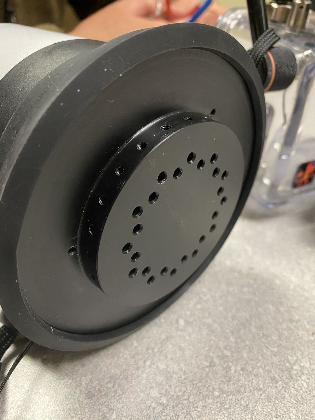 A drilled plate with a precision bolt circle